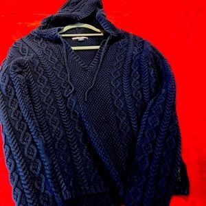 Hooded sweater in medium size in navy blue.